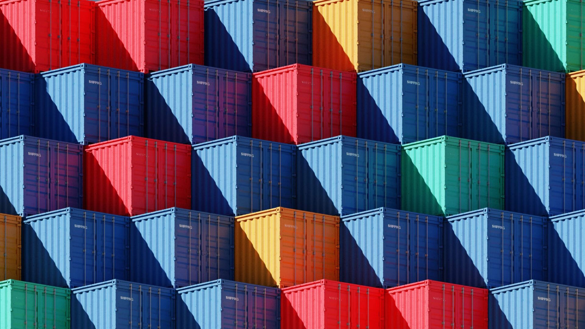 Colourful containers stacked with diagonal shadow.