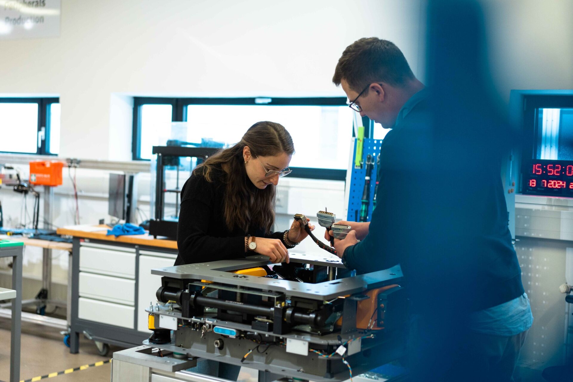 Thorsten and Federica working on an Autonomous Mobile Robot (AMR) 