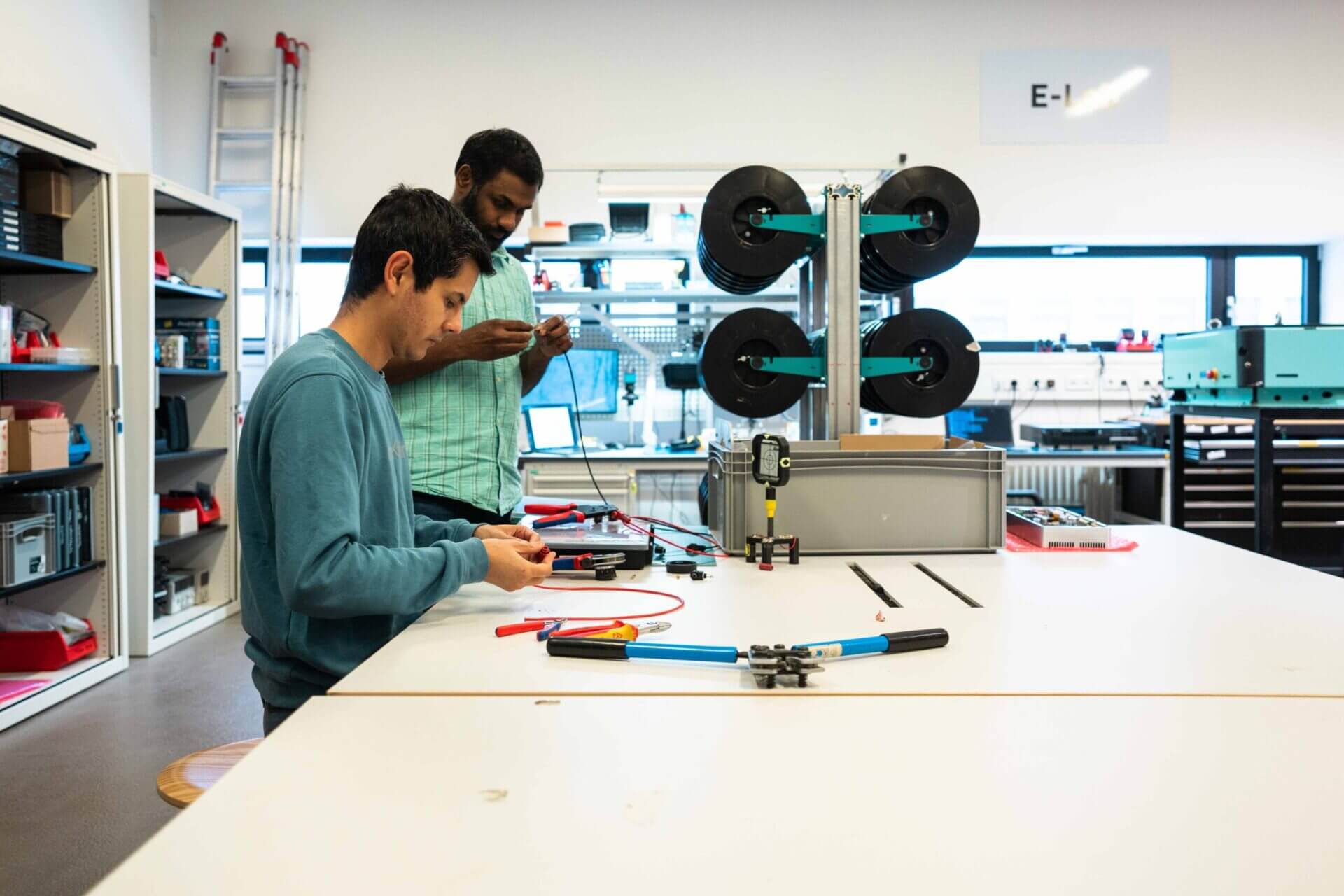 Two engineers working in the arculus lab